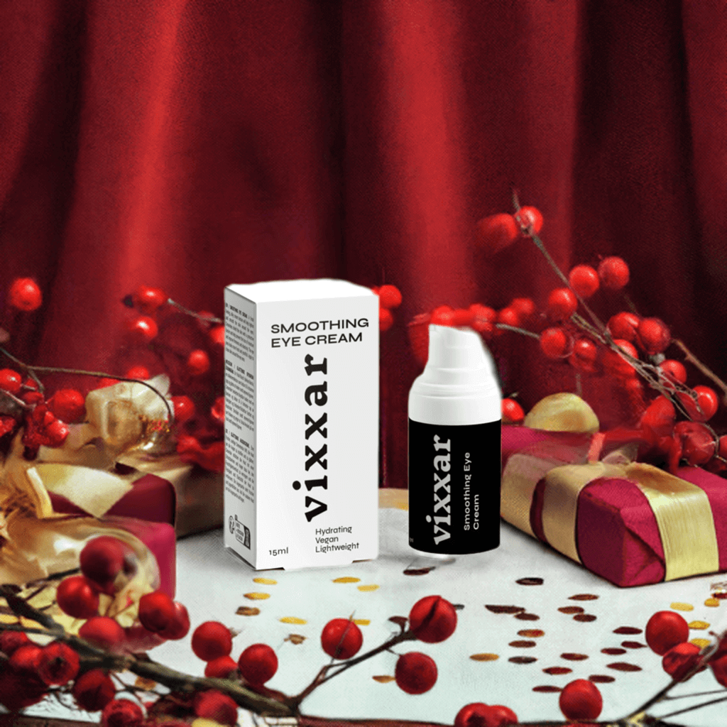 Vegan Smoothing Eye Cream by Vixxar, surrounded by festive red decor, offering lightweight hydration and anti-aging benefits.