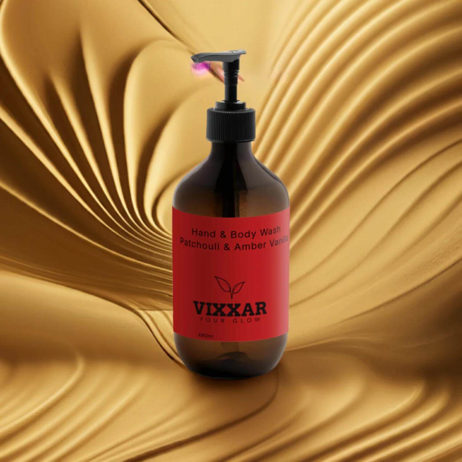 Patchouli & Amber Vanilla Hydrating Vegan Cleanser 490ml bottle on a luxurious golden background.