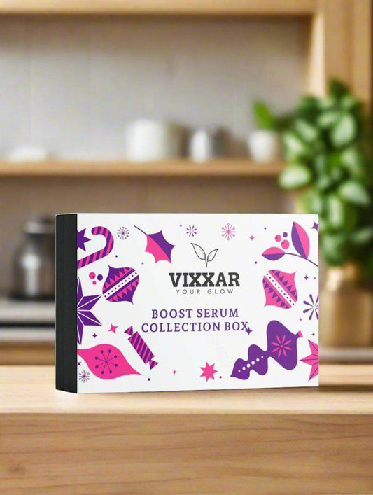 Vixxar Boost Serum Collection Box displayed on a wooden table, ideal for enhancing skincare routine with vegan, hydrating serums.