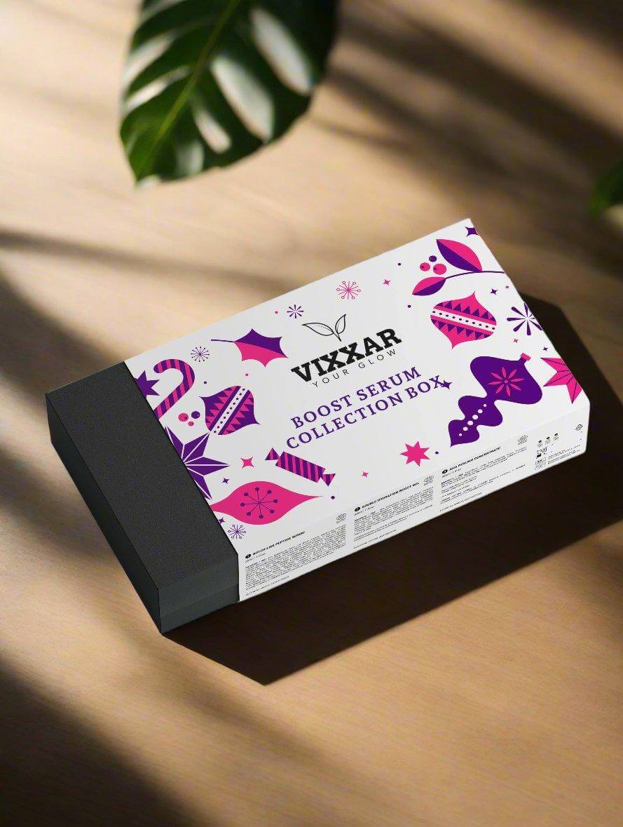 Vixxar Boost Serum Collection Box on a wooden surface with vibrant purple and pink design elements.