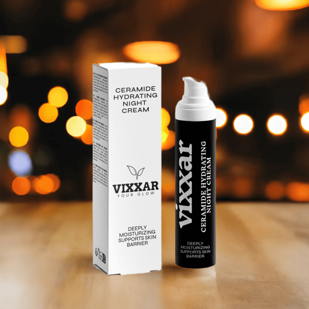 Vixxar Ceramide Hydrating Night Cream 50ml for dry aging skin with box and bottle on wooden table, background lights.