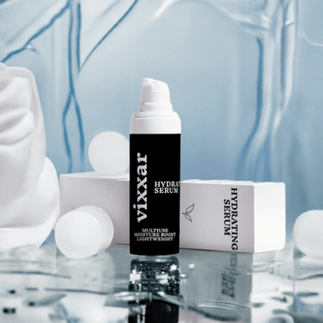 Hydrating face serum bottle with packaging, featuring hyaluronic acid and botanicals, provides intense moisture and radiant glow.
