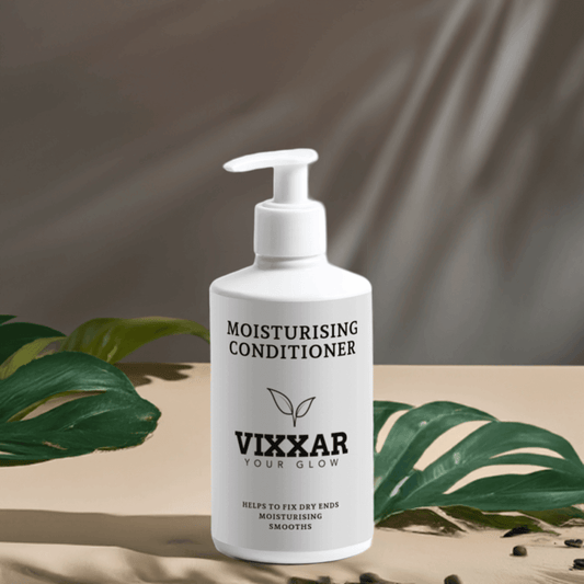 Moisturising Conditioner with Argan Oil & Aloe Repair for dry hair, 300ml bottle shown with natural leaves background.
