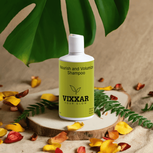 Nourish & Volumize Shampoo 300ml bottle with leaves and petals background, offering strength, hydration, and fuller hair benefits.