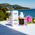Vixxar Peptide Serum displayed outdoors with flowers overlooking a sea view.