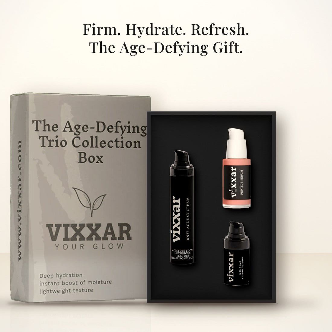 Open Vixxar Age-Defying Trio Collection Box: black inner box holding Anti-Age Day Cream, Peptide Serum and 3-in-1 Eye Cream for Men beside the sleeve