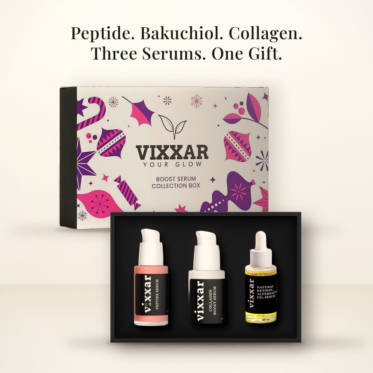 Open Vixxar Boost Serum Collection Box: black inner box holding Peptide Serum, Collagen Boost Serum and Natural Retinol Alternative Oil Serum beside the sleeve