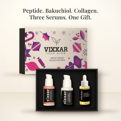 Open Vixxar Boost Serum Collection Box: black inner box holding Peptide Serum, Collagen Boost Serum and Natural Retinol Alternative Oil Serum beside the sleeve