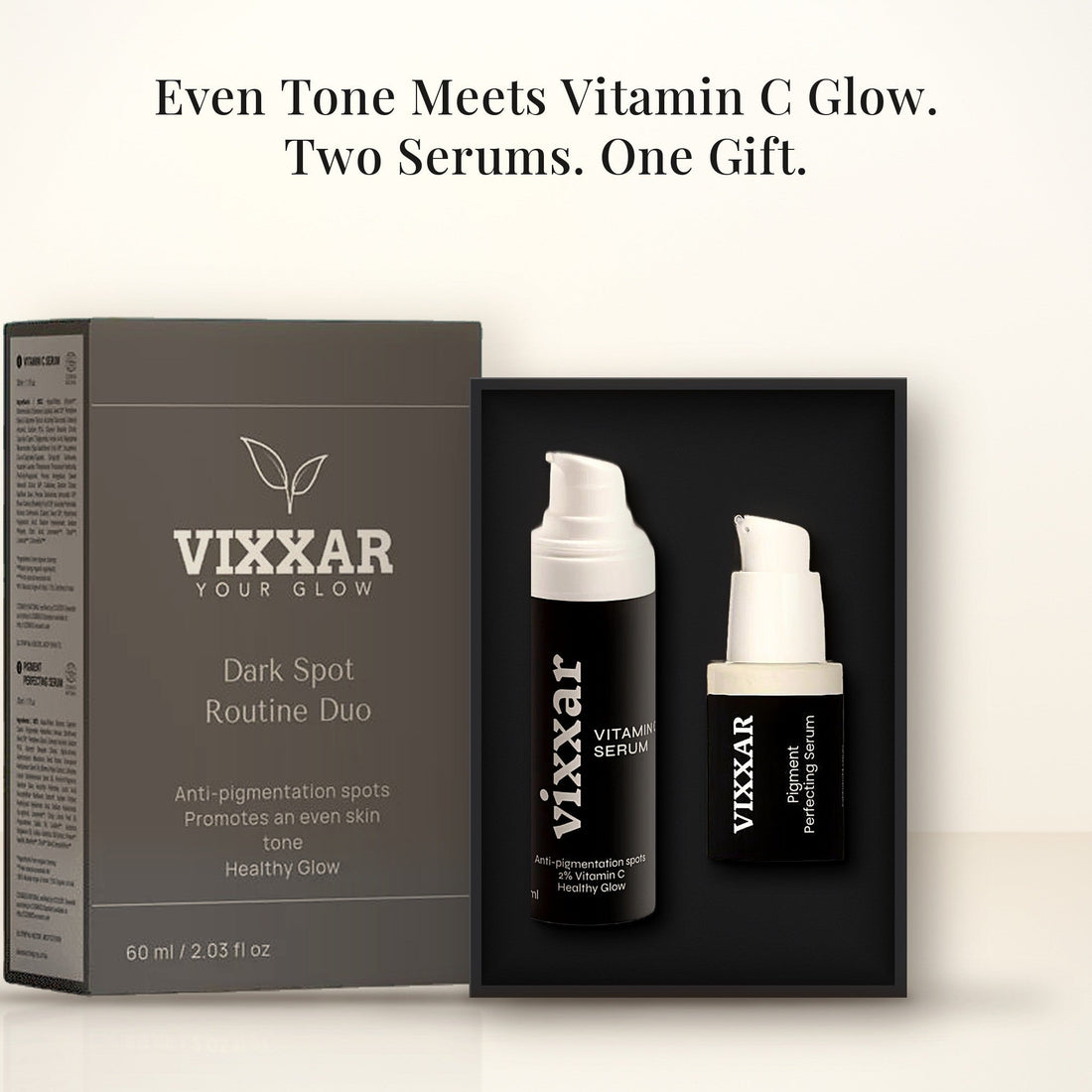 Open Vixxar Dark Spot Routine Duo: black inner box holding Vitamin C Serum and Pigment Perfecting Serum beside the sleeve