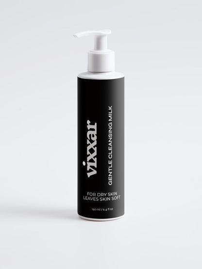 Vixxar Gentle Cleansing Milk face cleanser in a black pump bottle with white dispenser, front view on a light grey background