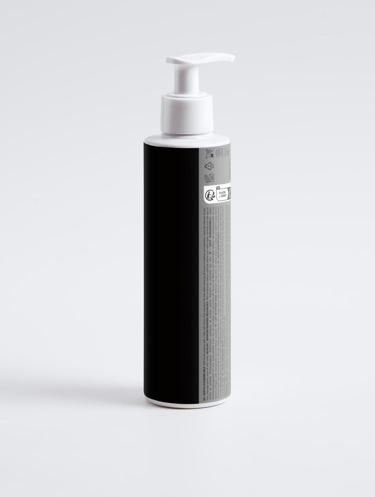 Back view of Vixxar Gentle Cleansing Milk pump bottle showing product information label and white dispenser