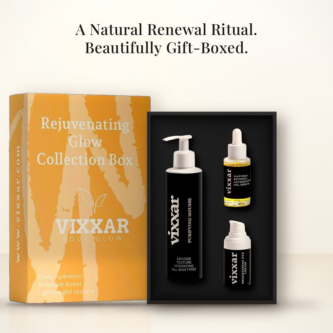 Open Vixxar Rejuvenating Glow Collection Box: black inner box holding Purifying Mousse, Natural Retinol Alternative Oil Serum and Brightening Eye Cream beside the sleeve