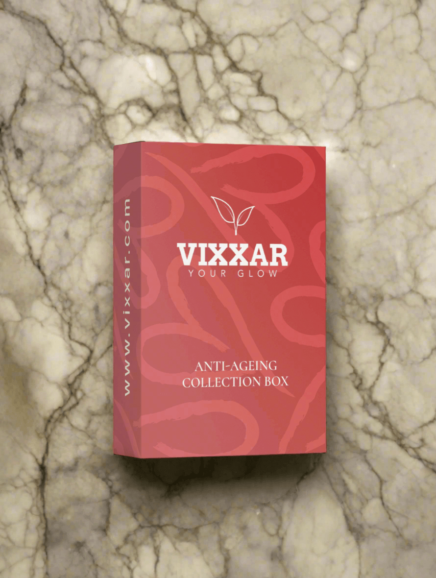Vixxar Anti-Ageing Collection Box on marble background featuring day cream, peptide serum, and eye cream for youthful skin.