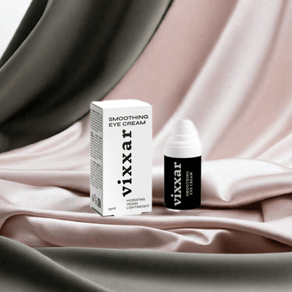 hydrate eye cream 15ml bottle and packaging on silky backdrop, promoting smooth skin and reducing puffiness for under-eye care