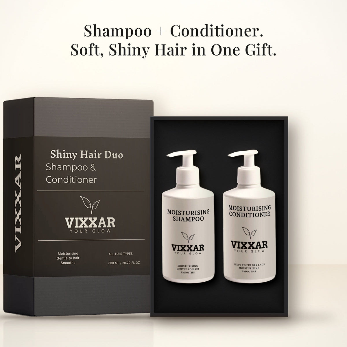 Open Vixxar Shiny Hair Duo: black inner box holding Moisturising Shampoo and Moisturising Conditioner beside the sleeve